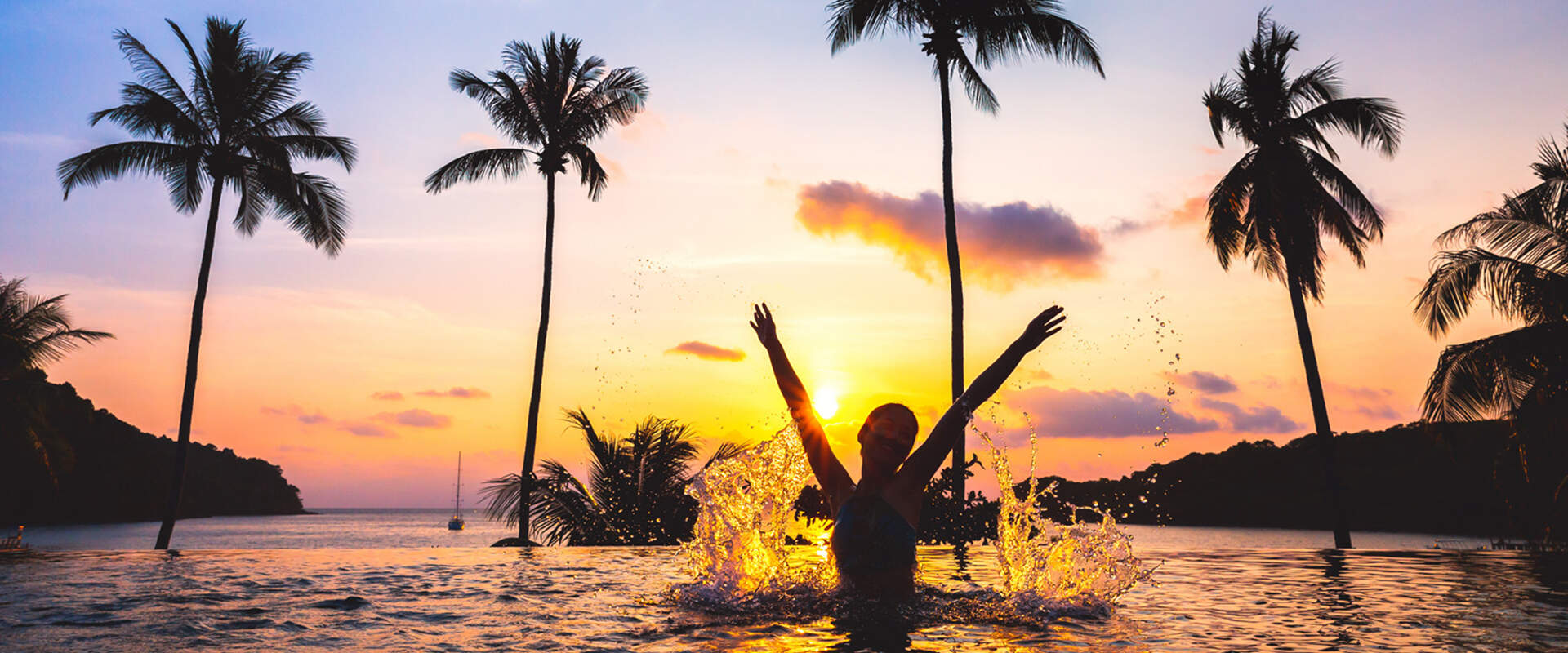 Serene sunset moment in a tropical infinity pool, likely in Thailand