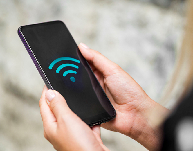 Smartphone displaying Wi-Fi symbol indicating wireless internet