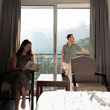 Couple chilling in the room at Fox Resorts Sri Lanka