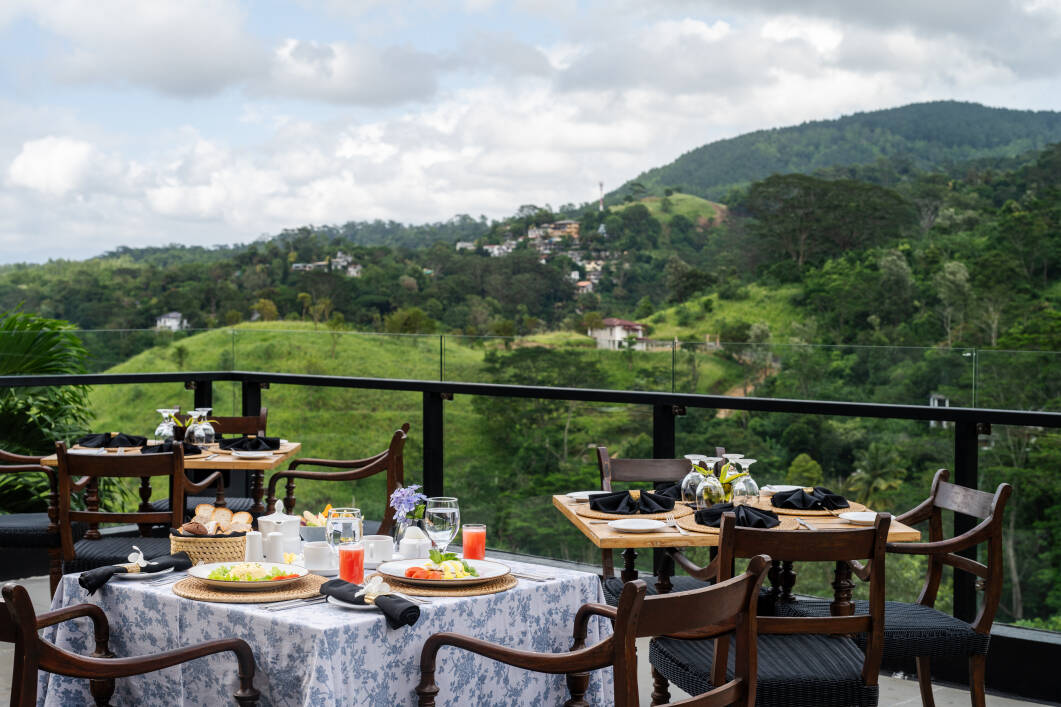Breakfast with Hantana hill views at Fox Kandy hotel Sri Lanka