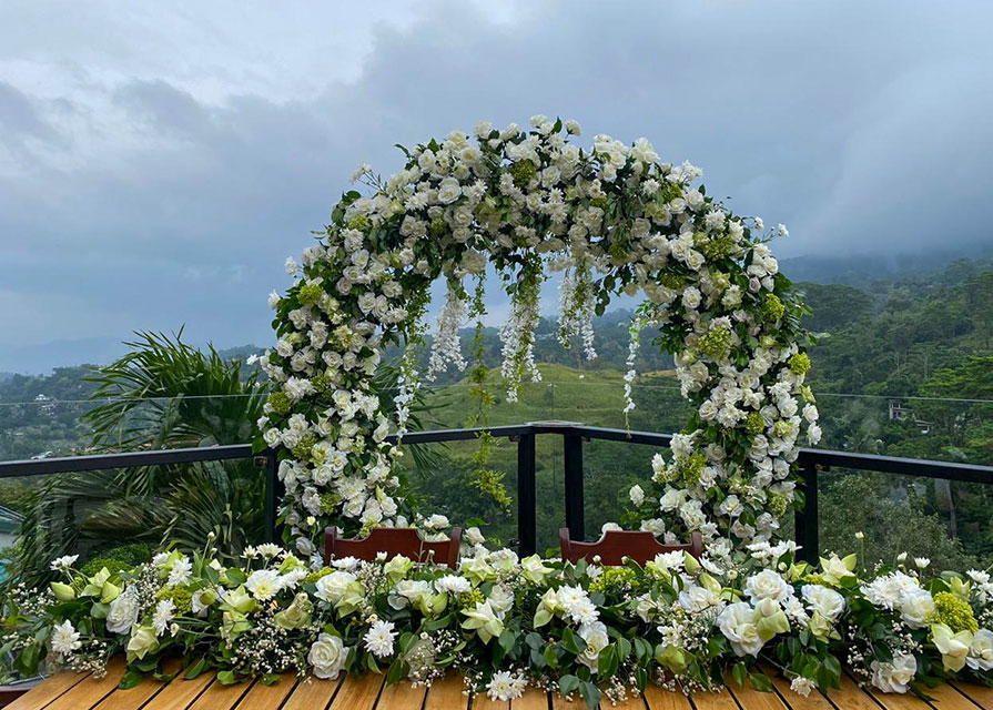 Outdoor wedding setup with floral arch at Fox Resorts Sri Lanka