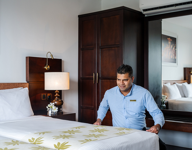 Staff preparing a guest room at Fox Resorts Sri Lanka