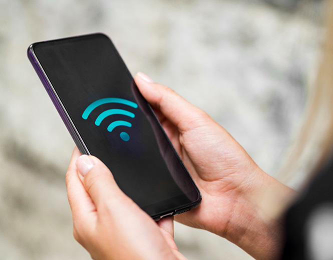 Smartphone showing Wi-Fi symbol representing wireless internet connectivity